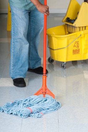 System4 Charleston janitor mopping floor